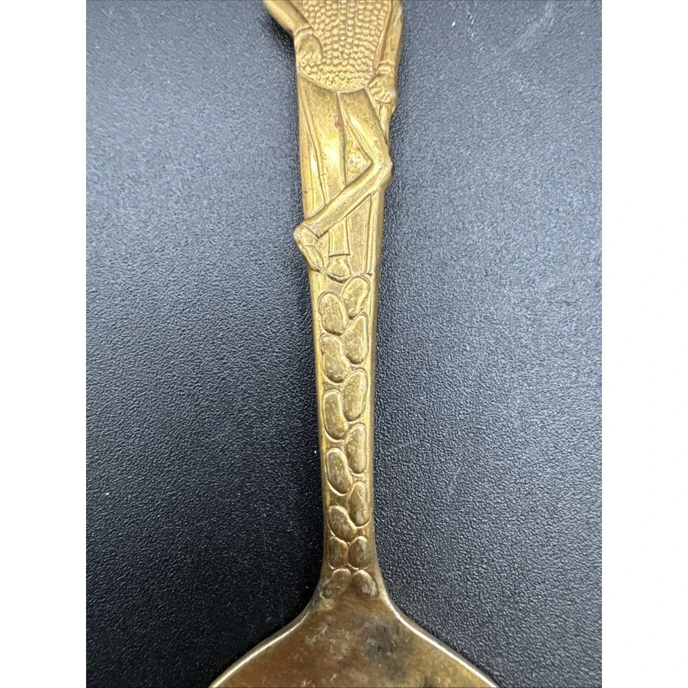 Vtg gold-toned Planters Mr Peanut advertising slotted serving spoon